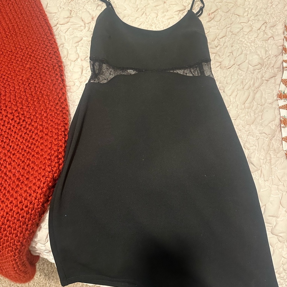 black dress, lace cutout.